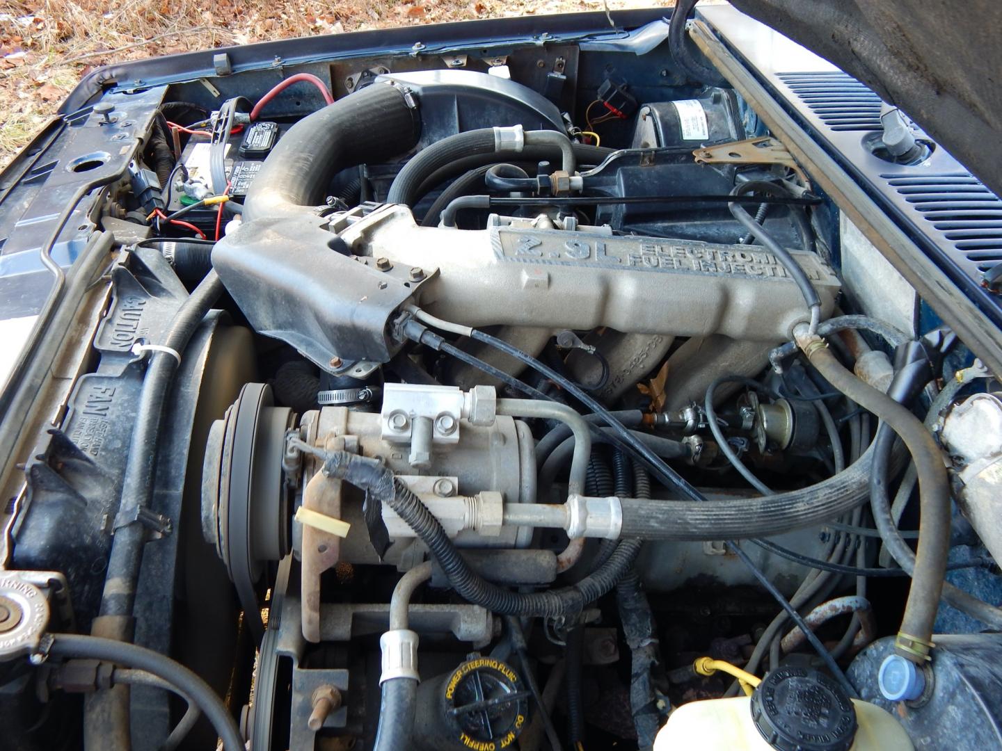 1988 Blue /Tan Ford Bronco II 4WD (1FMCU14T6JU) with an 2.9L V6 OHV 12V engine, 4-Speed Automatic Overdrive transmission, located at 6528 Lower York Road, New Hope, PA, 18938, (215) 862-9555, 40.358707, -74.977882 - Here we have a 1988 Ford Bronco 2 with a 2.9L V6 putting power to a 4x4 automatic transmission. Options include: tan cloth interior, heat/AC, XD Vision radio, power windows, cruise control, tilt steering wheel, front/rear defrost windows, spare tire cover, 15 inch alloy wheels with 4 Solarus AP tire - Photo#34